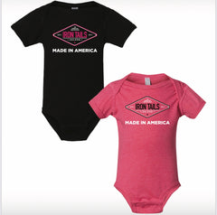 Black onesie with pink logo and pink onesie with black logo